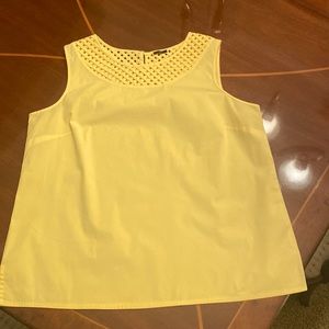 Sleeveless yellow blouse
